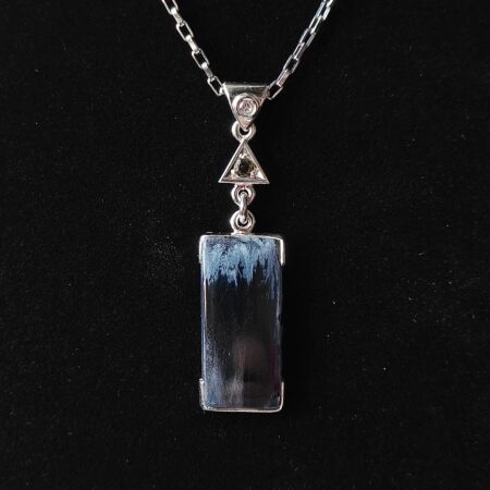 Pietersite pendant with moldavite and sapphire